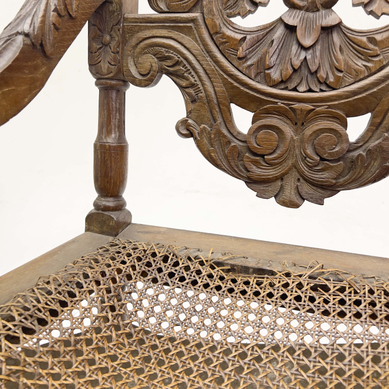 6 carved wood chairs with cane seats