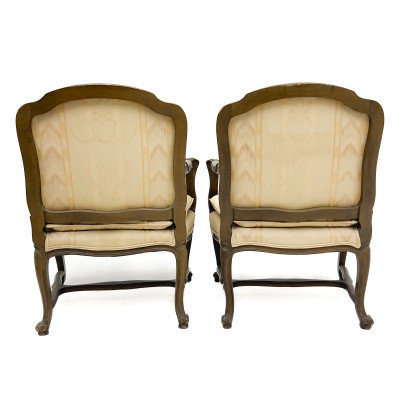 A Pair of Louis XV Style Carved Wood Upholstered Fauteuils