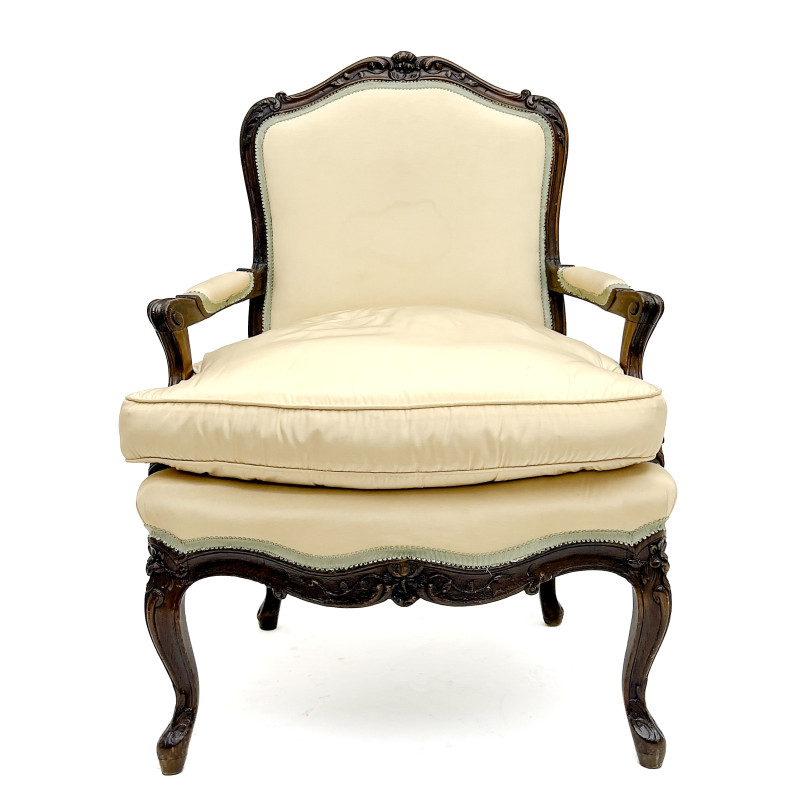 A Louis XV Style Carved Wood Upholstered Bergère