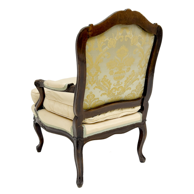 A Louis XV Style Carved Wood Upholstered Bergère
