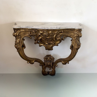 A Louis XV Giltwood and Marble-Top Hanging Console Table