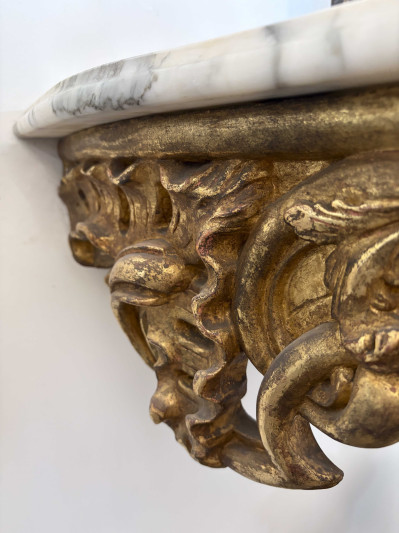 A Louis XV Giltwood and Marble-Top Hanging Console Table