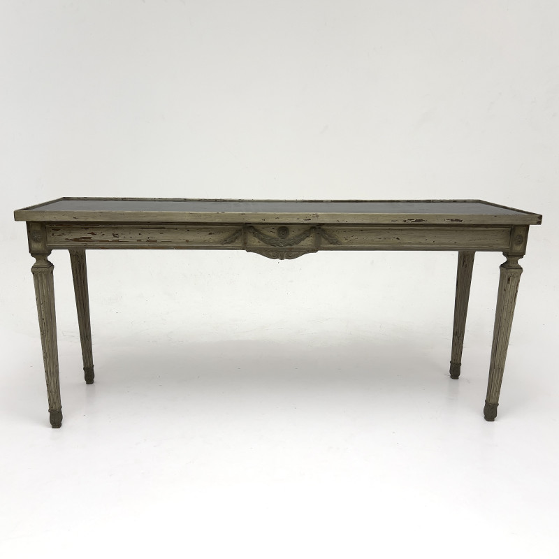 A Neoclassical Style Patinated Wood and Fumé Glass Console Table