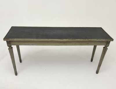 A Neoclassical Style Patinated Wood and Fumé Glass Console Table