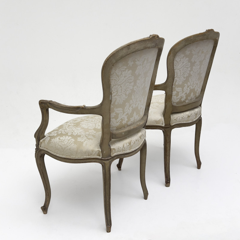 A Pair of Louis XV Style Carved Beechwood Fauteuils
