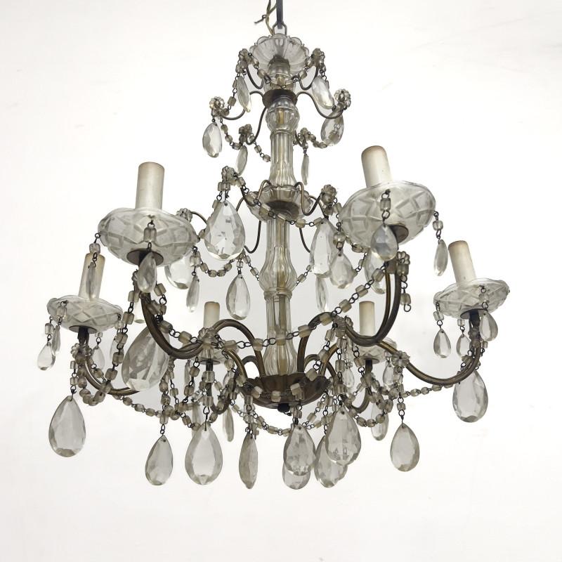A Louis XV Style Cut Glass and Gilt-Bronze Eight-Light Chandelier
