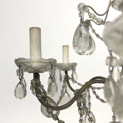 A Louis XV Style Cut Glass and Gilt-Bronze Eight-Light Chandelier