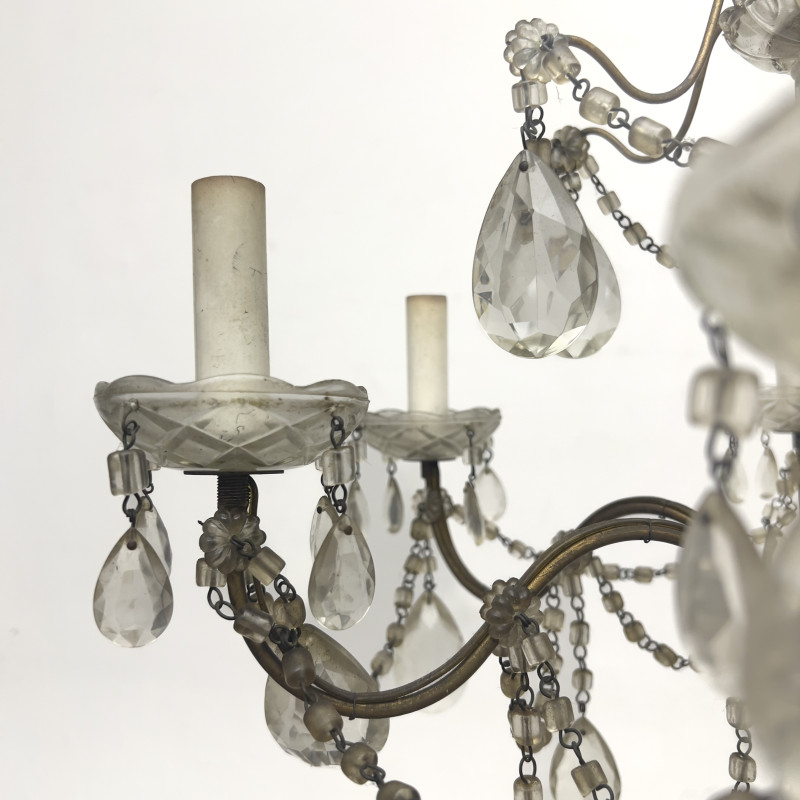 A Louis XV Style Cut Glass and Gilt-Bronze Eight-Light Chandelier