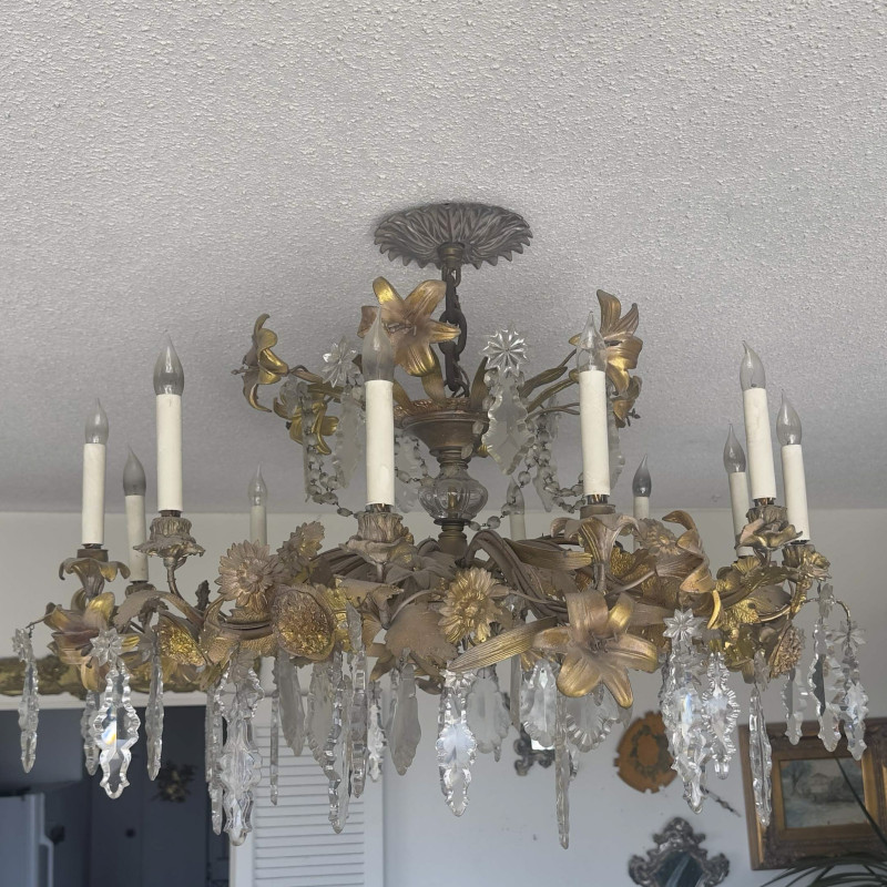 A French Rococo Style Gilt-Bronze and Crystal Twelve-Light Chandelier