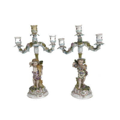 Image for Lot A Pair of German Porcelain Four-Light Figural Candelabras in the Dresden Style
