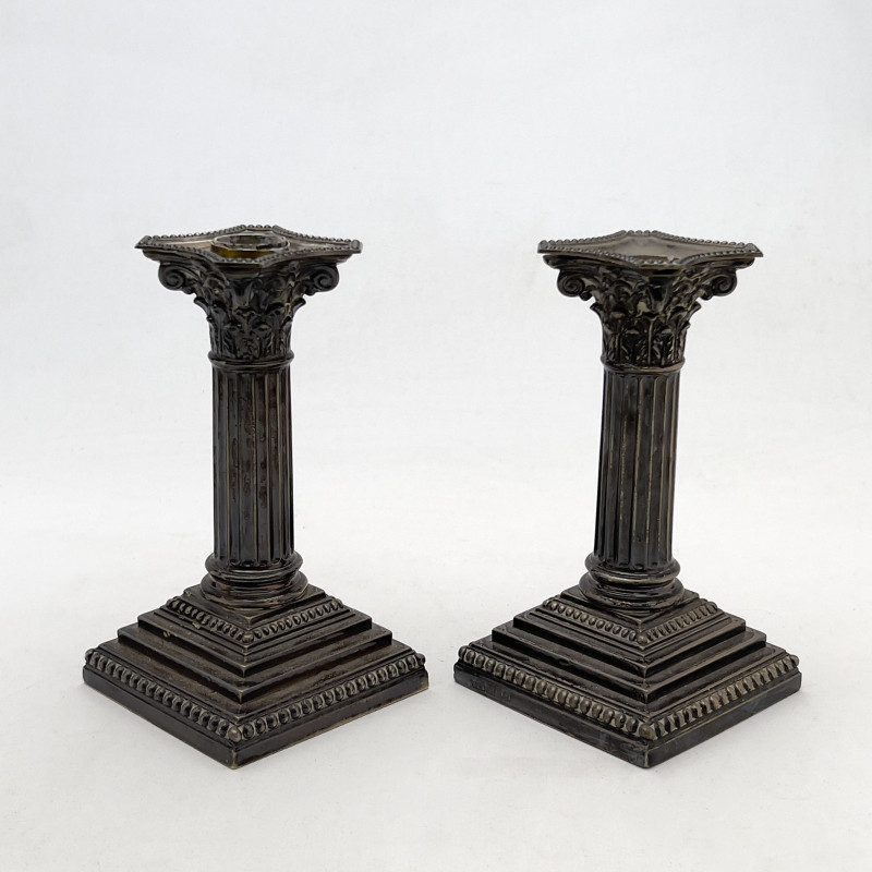 Assembled Group of Brass and Silver Candlesticks