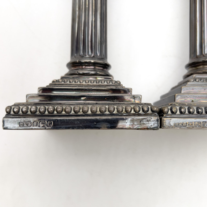 Assembled Group of Brass and Silver Candlesticks