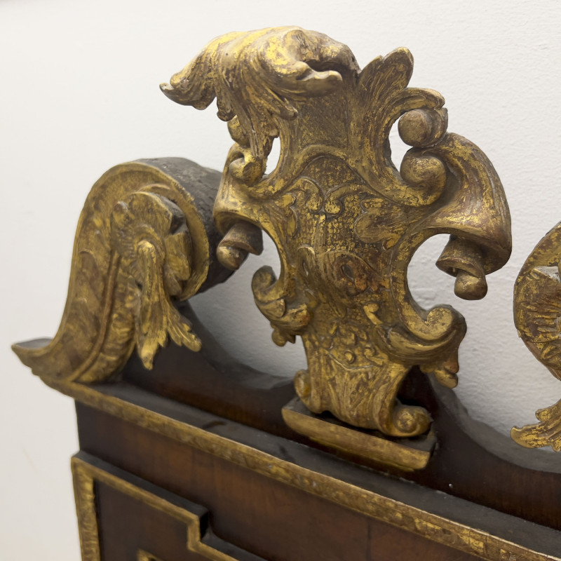 An English George II parcel-gilt mahogany pier mirror