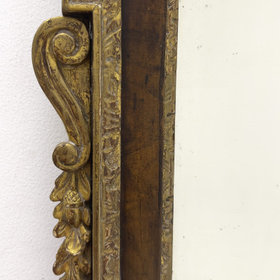An English George II parcel-gilt mahogany pier mirror