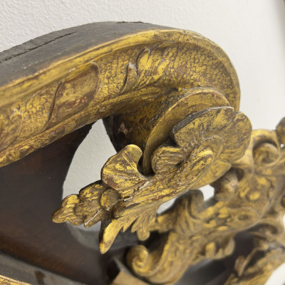 An English George II parcel-gilt mahogany pier mirror