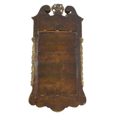 An English George II parcel-gilt mahogany pier mirror