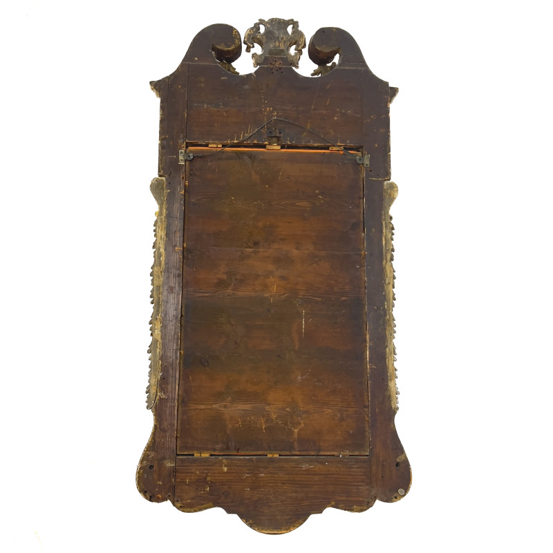An English George II parcel-gilt mahogany pier mirror