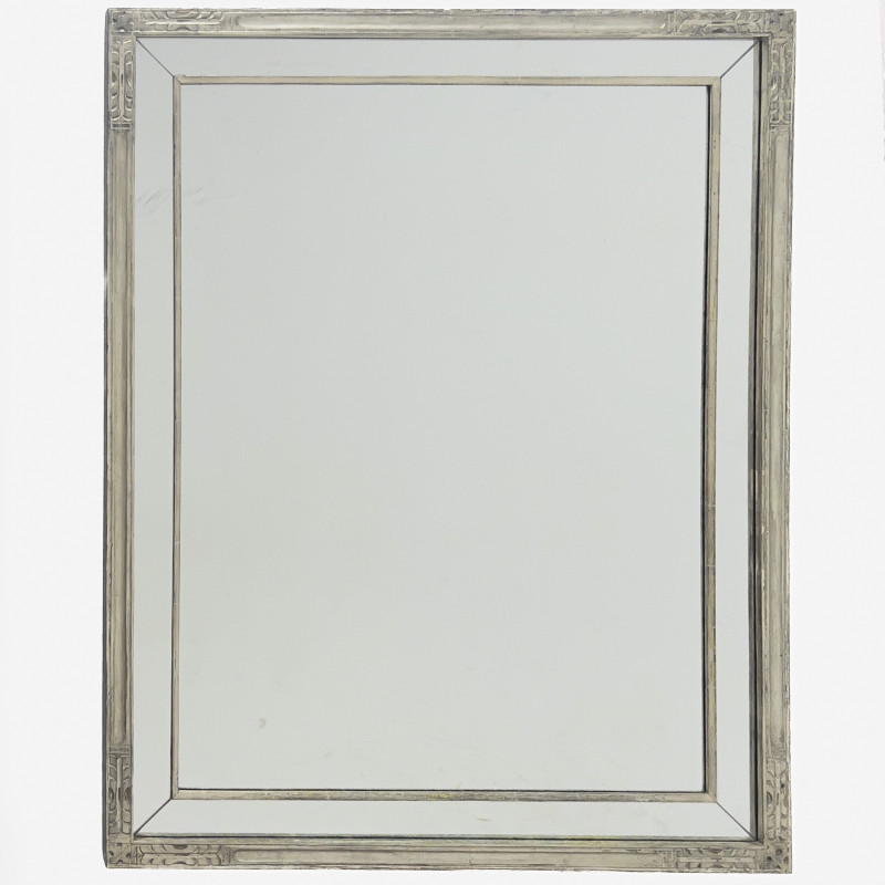 A Contemporary Carved Wood Wall Mirror