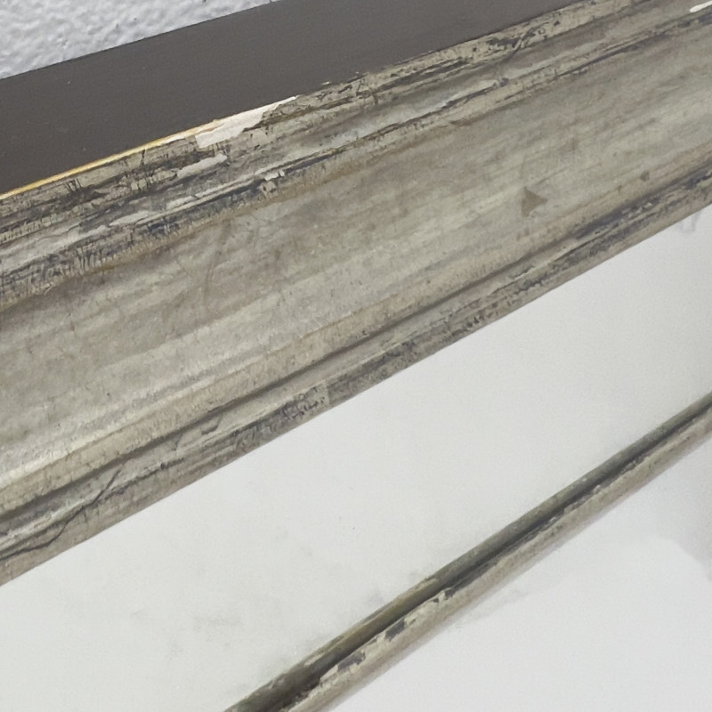 A Contemporary Carved Wood Wall Mirror