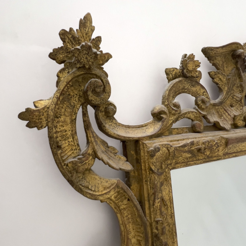 A Rococo Style Giltwood Wall Mirror
