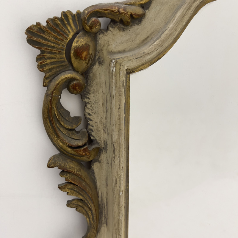 A Venetian Rococo Style Painted and Parcel-Gilt Wall Mirror