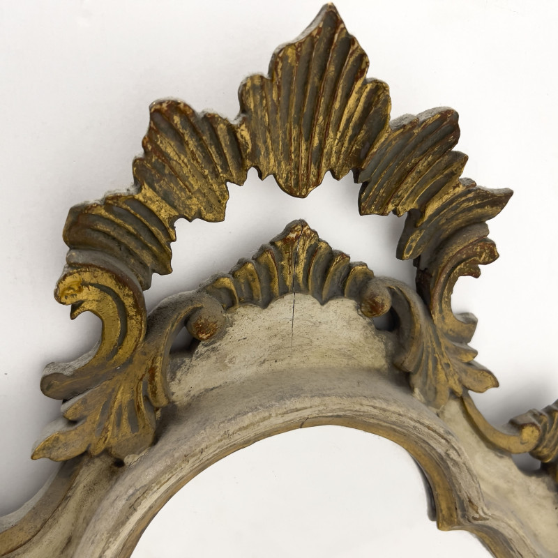 A Venetian Rococo Style Painted and Parcel-Gilt Wall Mirror