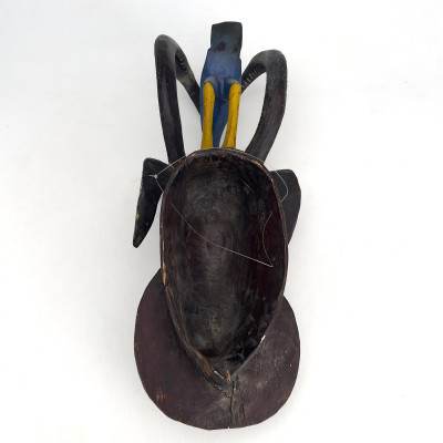 A West African Guro Polychrome Wooden Mask