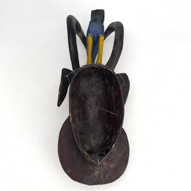 A West African Guro Polychrome Wooden Mask