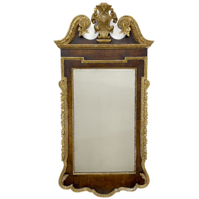 Image for Lot An English George II parcel-gilt mahogany pier mirror