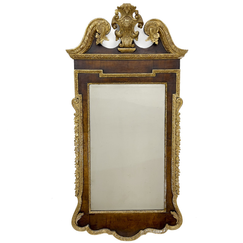 An English George II parcel-gilt mahogany pier mirror