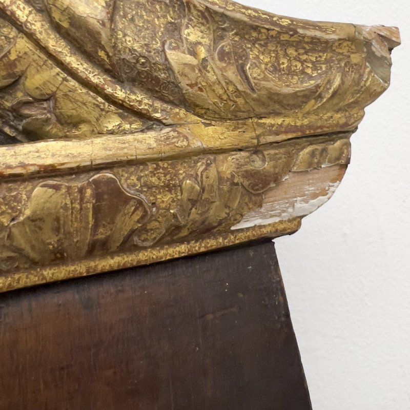 An English George II parcel-gilt mahogany pier mirror