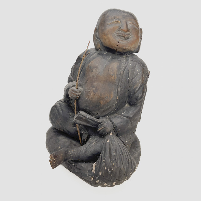 An Assembled Group of Three Asian Wooden Figural Carvings and Sculptures
