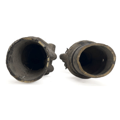 A Pair of Chinese Bronze or Brass Figural Candlesticks