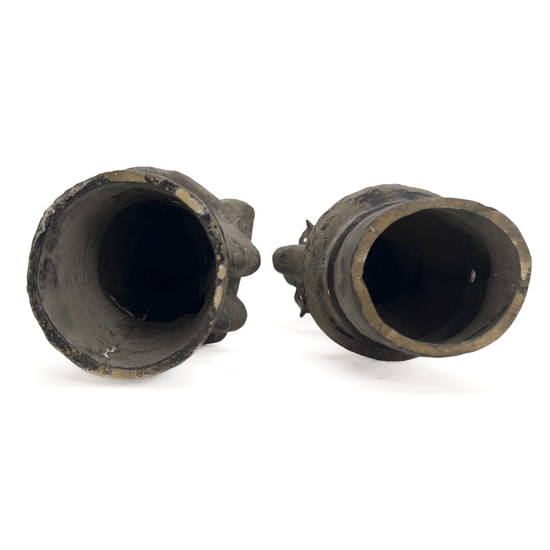 A Pair of Chinese Bronze or Brass Figural Candlesticks