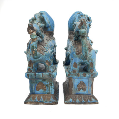 A Pair of Chinese Glazed Turquoise Ceramic Guardian Lions