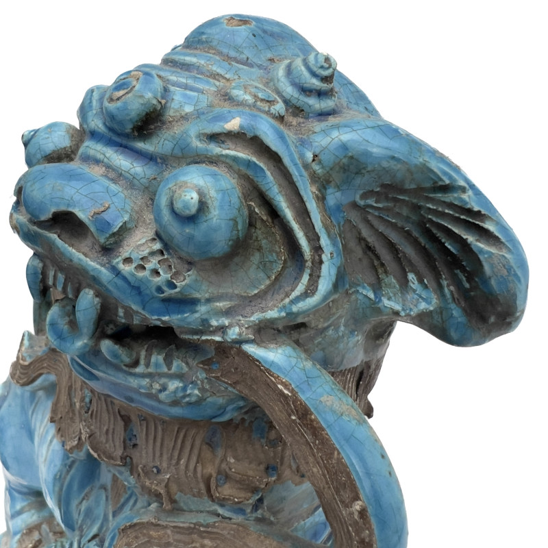 A Pair of Chinese Glazed Turquoise Ceramic Guardian Lions