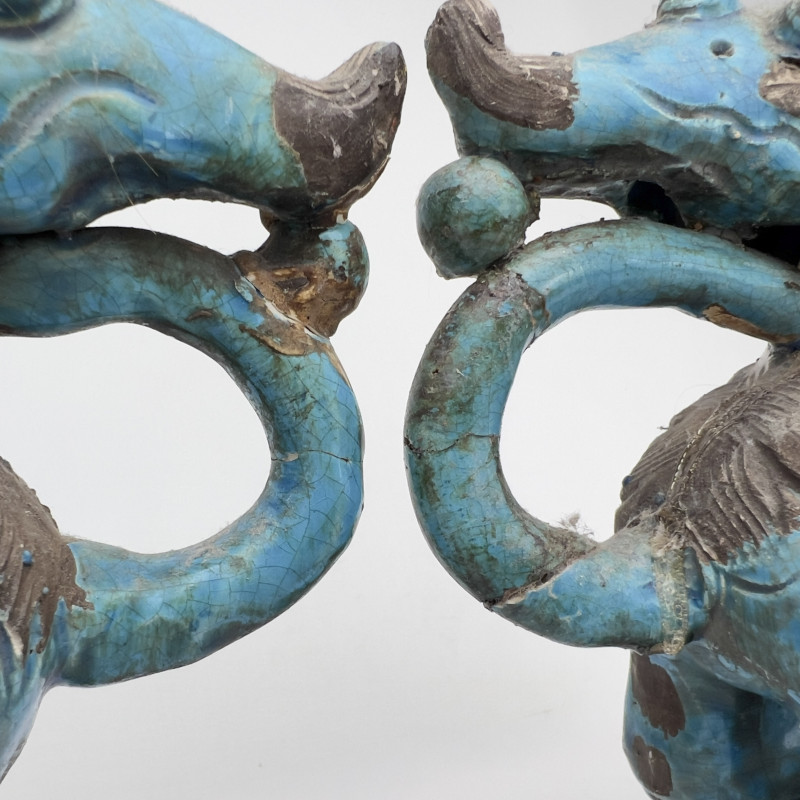 A Pair of Chinese Glazed Turquoise Ceramic Guardian Lions