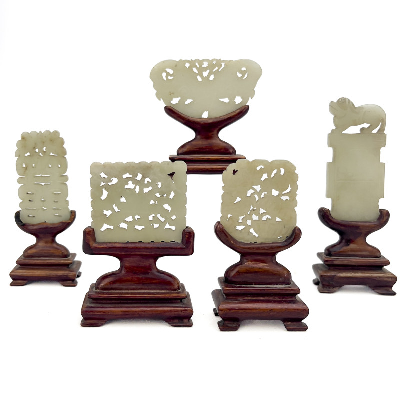 Group of Five Chinese Carved Jade Plaques on Wood Stands