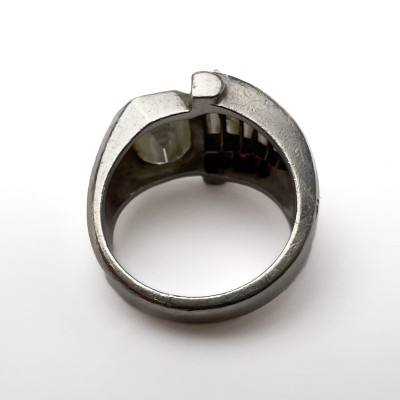 An Art Deco diamond, ruby, and platinum cocktail ring