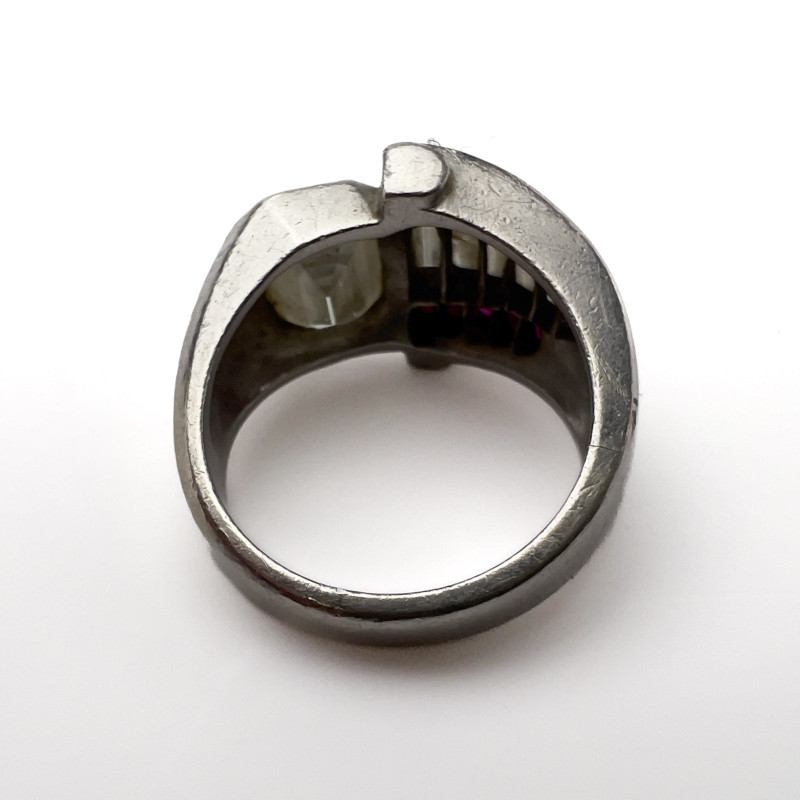 An Art Deco diamond, ruby, and platinum cocktail ring