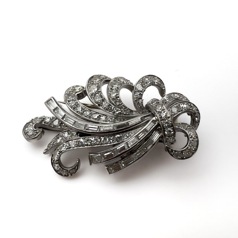 A mid-century platinum and diamond spray brooch