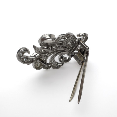 A mid-century platinum and diamond spray brooch