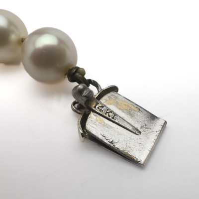 A Cultured Pearl and Diamond Three-Piece Jewelry Selection