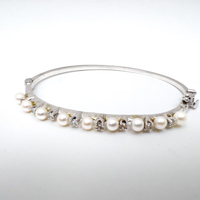 A Cultured Pearl and Diamond Three-Piece Jewelry Selection
