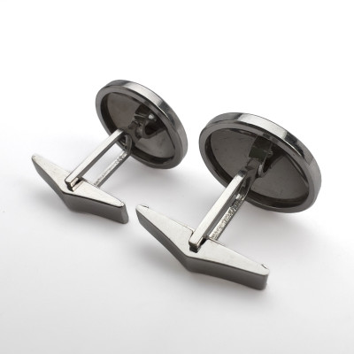 A pair of 14k white gold and diamond cufflinks