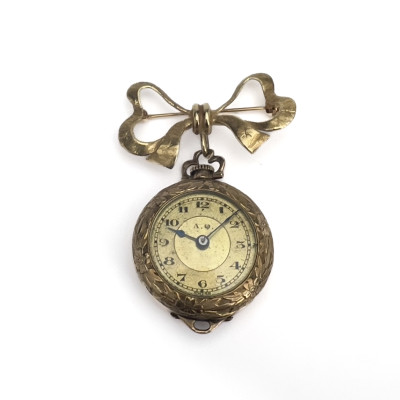 Image for Lot Swiss Gold-Tone Pendant Watch on a 14K Yellow Gold Bow Brooch