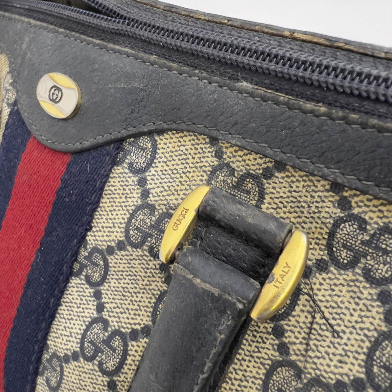 Gucci - A two-piece monogram handbag lot
