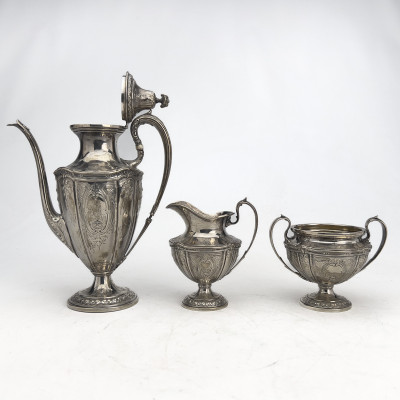 Theodore B. Starr - Four-Piece Coffee Service in Sterling Silver with Accompanying Silver-Plated Tray