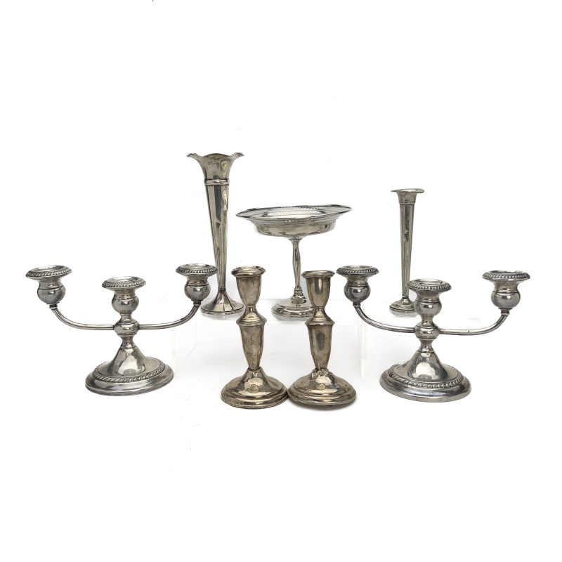 A Group of Seven Weighted Sterling Silver Table Articles