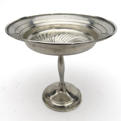 A Group of Seven Weighted Sterling Silver Table Articles